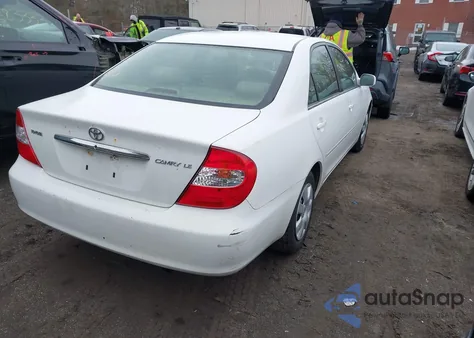 2003 Toyota Camry Le z USA, uszkodzony, nr VIN 4T1BE32K13U134101